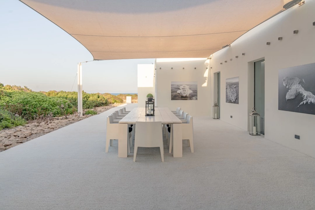 1685638273- Prospectors Luxury real estate Ibiza to rent villa Eden spain property rental sunset view private island sea private chef dining outside.webp